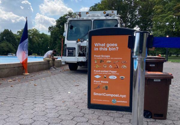 DSNY sign listing what things should be put in compost bins at a press conference in Flushing Meadows-Corona Park, Queens, on August 8, 2022. (David Wagner/Epoch Times)