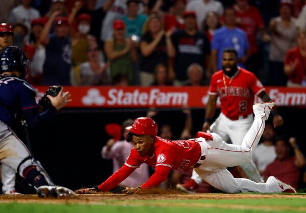 Magneuris Sierra #37 of the Los Angeles Angels is out at home plate against the Minnesota Twins in the ninth inning at Angel Stadium of Anaheim in Anaheim, on August 13, 2022. (Ronald Martinez/Getty Images)