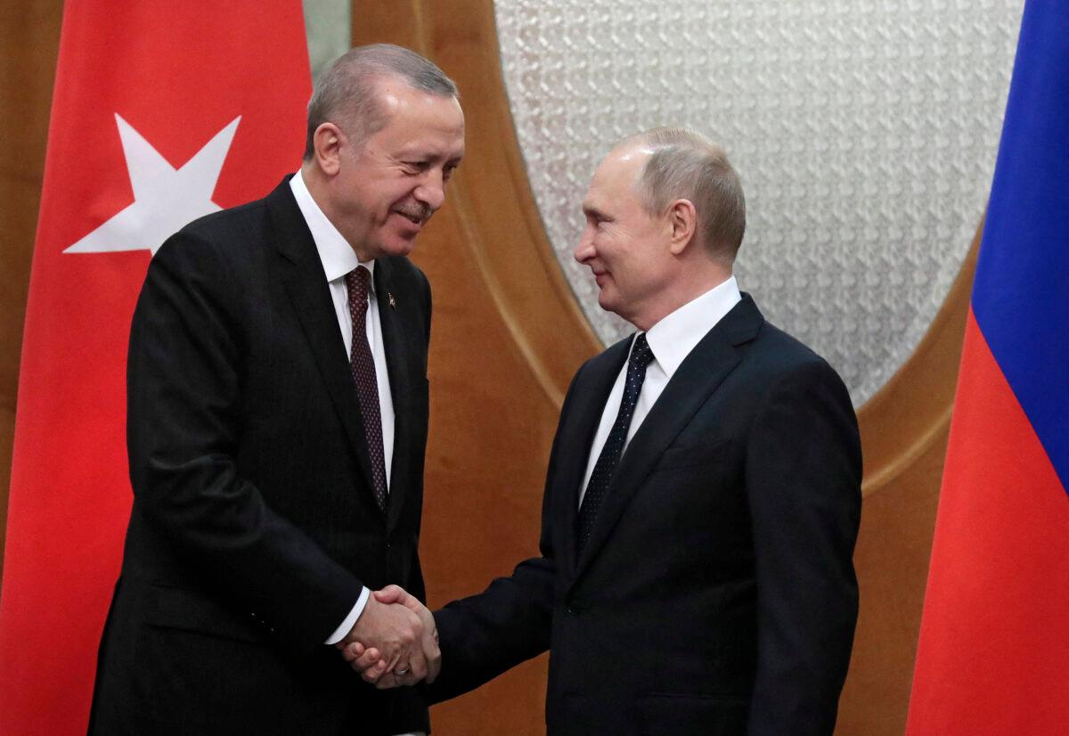 Russian President Vladimir Putin meets with his Turkish counterpart Recep Tayyip Erdogan (L) in the Black Sea resort of Sochi, Russia, on Feb. 14, 2019. (Sergei Chirikov/Pool/AFP via Getty Images)