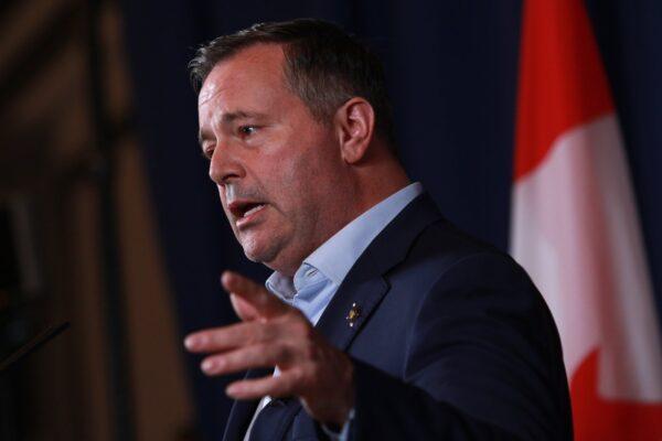 Alberta Premier Jason Kenney answers questions during a press conference in Victoria, B.C., on July 12, 2022. (The Canadian Press/Chad Hipolito)