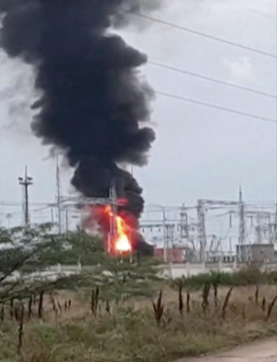 Smoke rising above a transformer electric substation, which caught fire after a blast in the Dzhankoi district, Crimea, on Aug. 16, 2022. (Screenshot/Video via Reuters)