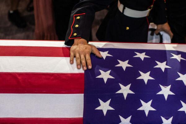 People pay their respects during the funeral of Marine Lance Cpl. Kareem Grant Nikoui at the Harvest Christian Fellowship in Riverside, Calif., on Sept. 18, 2021. (Apu Gomes/AFP via Getty Images)