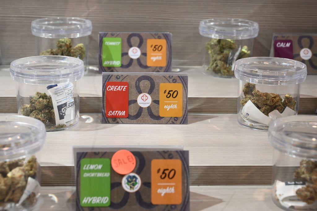Jars of marijuana "flower" are seen being sold in this Los Angeles dispensary in January 2019. (Robyn Beck/AFP via Getty Images)