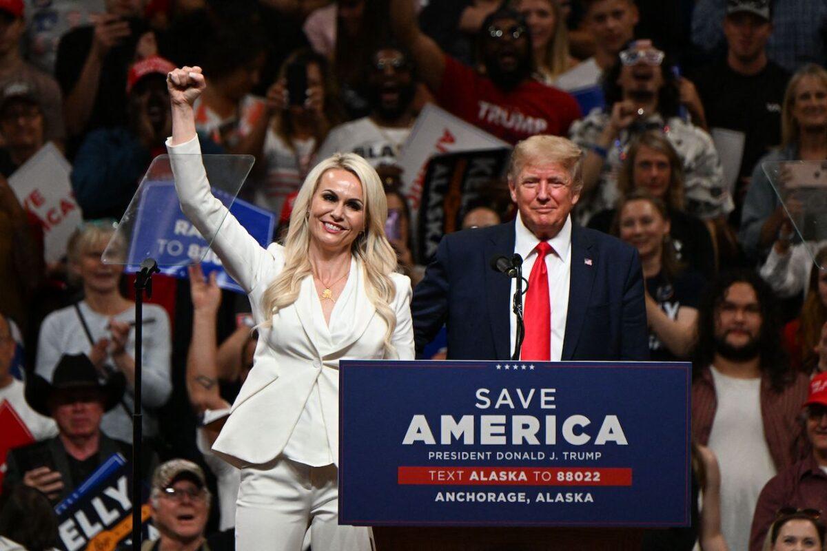 U.S. Senate candidate Kelly Tshibaka (L) speaks alongside former President Donald Trump during a "Save America" rally campaigning in support of Republican candidates in Anchorage, Alaska, on July 9, 2022. (Patrick T. Fallon/AFP via Getty Images)