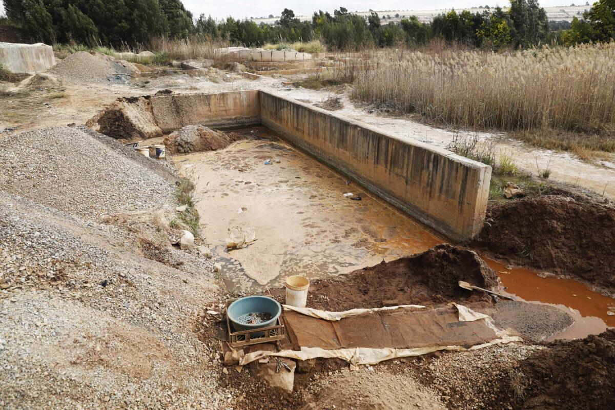 A general view of the illegal mining setup used to extract gold dust near the Harmony Gold Mining Operations in Randfontein on Aug. 2, 2022. (Phill Magakoe/AFP via Getty Images)