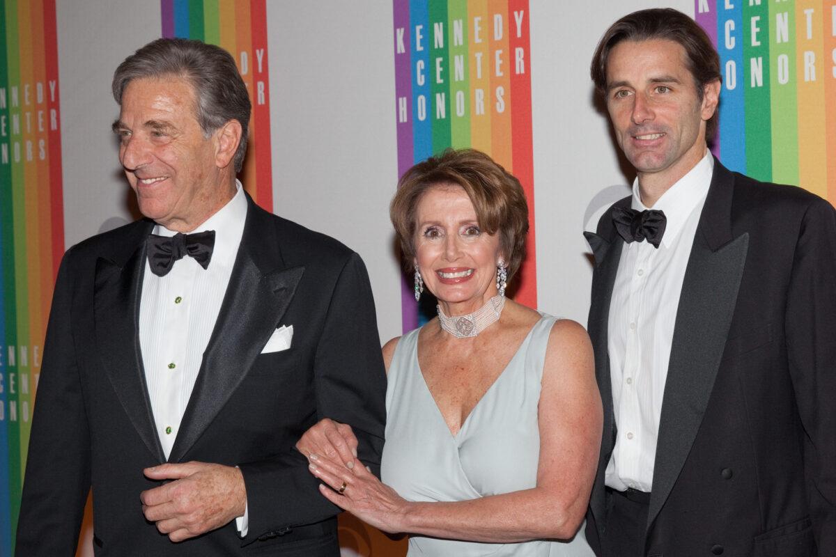 Then-House Minority Leader Nancy Pelosi (C) arrives with her husband Paul Pelosi (L) and son Paul Pelosi Jr. at the 35th Kennedy Center Honors at the Kennedy Center in Washington on Dec. 2, 2012. (Drew Angerer/AFP via Getty Images)