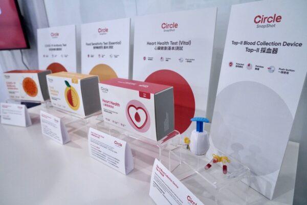 The testing company said it only takes two minutes for users to collect the blood samples they need at a launch presentation on Aug. 16, 2022. (Adrian Yu/The Epoch Times)