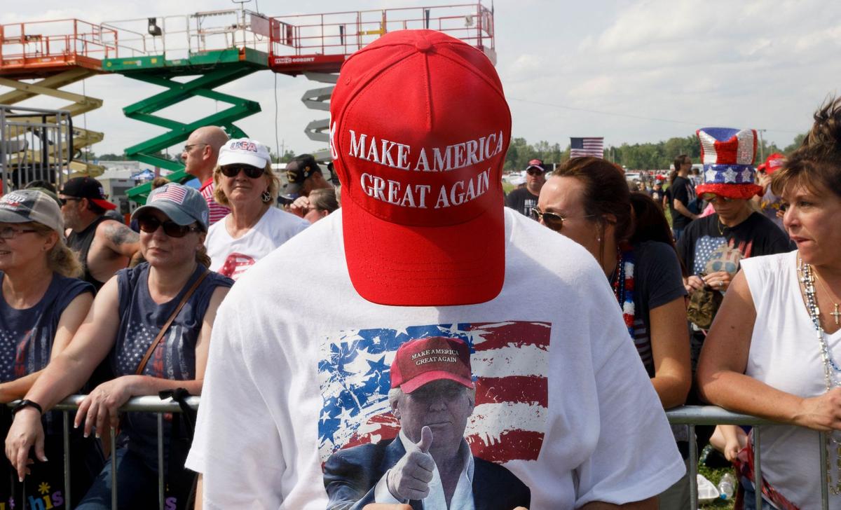 A Trump supporter shows his MAGA hat during a Trump campaign-style rally in Wellington, Ohio, on June 26, 2021. (Stephen Zenner/AFP via Getty Images)