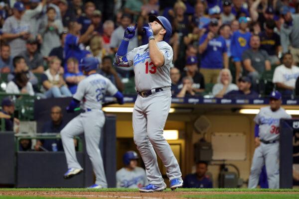 Max Muncy, No. 13 of the Los Angeles Dodgers, celebrates a home run during the seventh inning against the Milwaukee Brewers at American Family Field in Milwaukee on Aug. 17, 2022. (Stacy Revere/Getty Images)