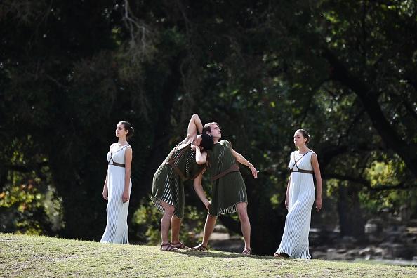 Actors and actresses perform at the Temple of Hera in Olympia, the sanctuary where the Olympic Games were born in 776 B.C., on Oct. 24, 2017, during the lighting ceremony of the Olympic flame for the 2018 Winter Olympics in Pyeongchang, South Korea.<br/> (Aris Messinis/AFP via Getty Images)