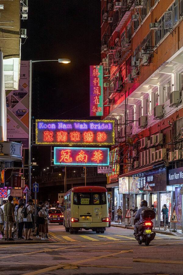 Red minibuses and neon signs are unique characteristics of Hong Kong. (TM Chan /The Epoch Times)