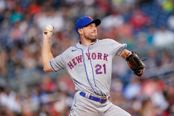 New York Mets starting pitcher Max Scherzer throws during the second inning of a baseball game against the Washington Nationals at Nationals Park, in Washington, Monday, Aug. 1, 2022. (Alex Brandon/AP Photo)