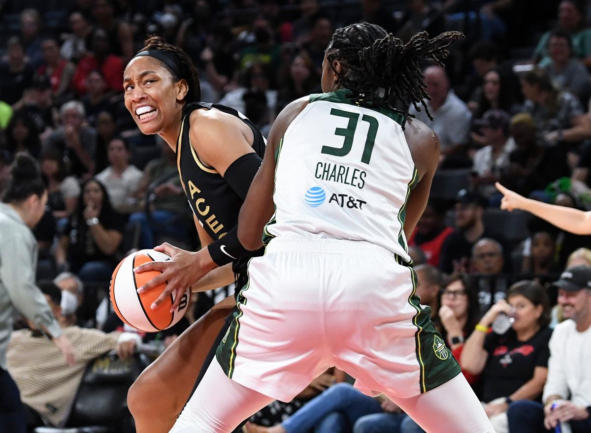Las Vegas Aces forward A'ja Wilson (L), looks to shoot past Seattle Storm center Tina Charles (31) during the first half of a WNBA basketball game in Las Vegas on Aug. 14, 2022. (Sam Morris/AP Photo)