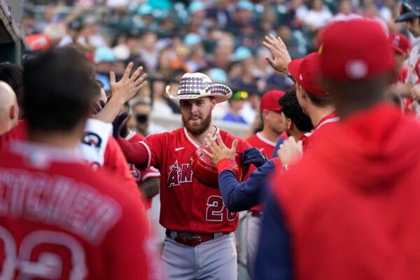 Los Angeles Angels' Jared Walsh (20) celebrates his home run against the Detroit Tigers in the second inning of a baseball game in Detroit, Aug. 19, 2022. (Paul Sancya/AP Photo)