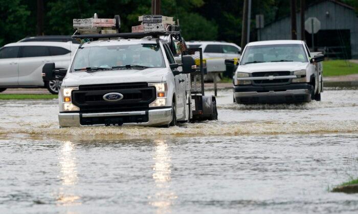 Rapid Rainfall Floods Buildings and Highways in Deep South