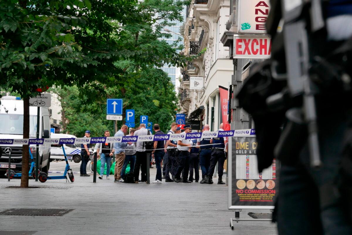 Police cordon off an area in the center of Brussels after an incident in which a van hit a terrace in Brussels, on Aug. 26, 2022. (Sylvain Plazy/AP Photo)