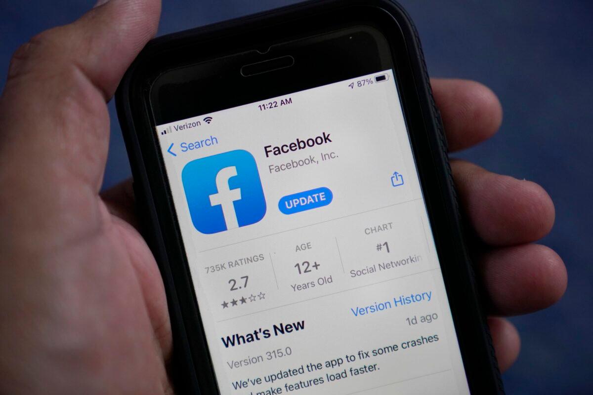 The Facebook app is shown on a smartphone in Surfside, Fla., on April 23, 2021. (Wilfredo Lee, File/AP Photo)