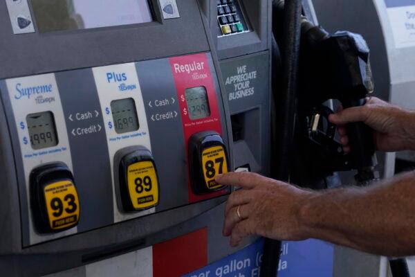 A customer pumps gas at an Exxon gas station, in Miami, Fla., on May 10, 2022. (Marta Lavandier/AP Photo)