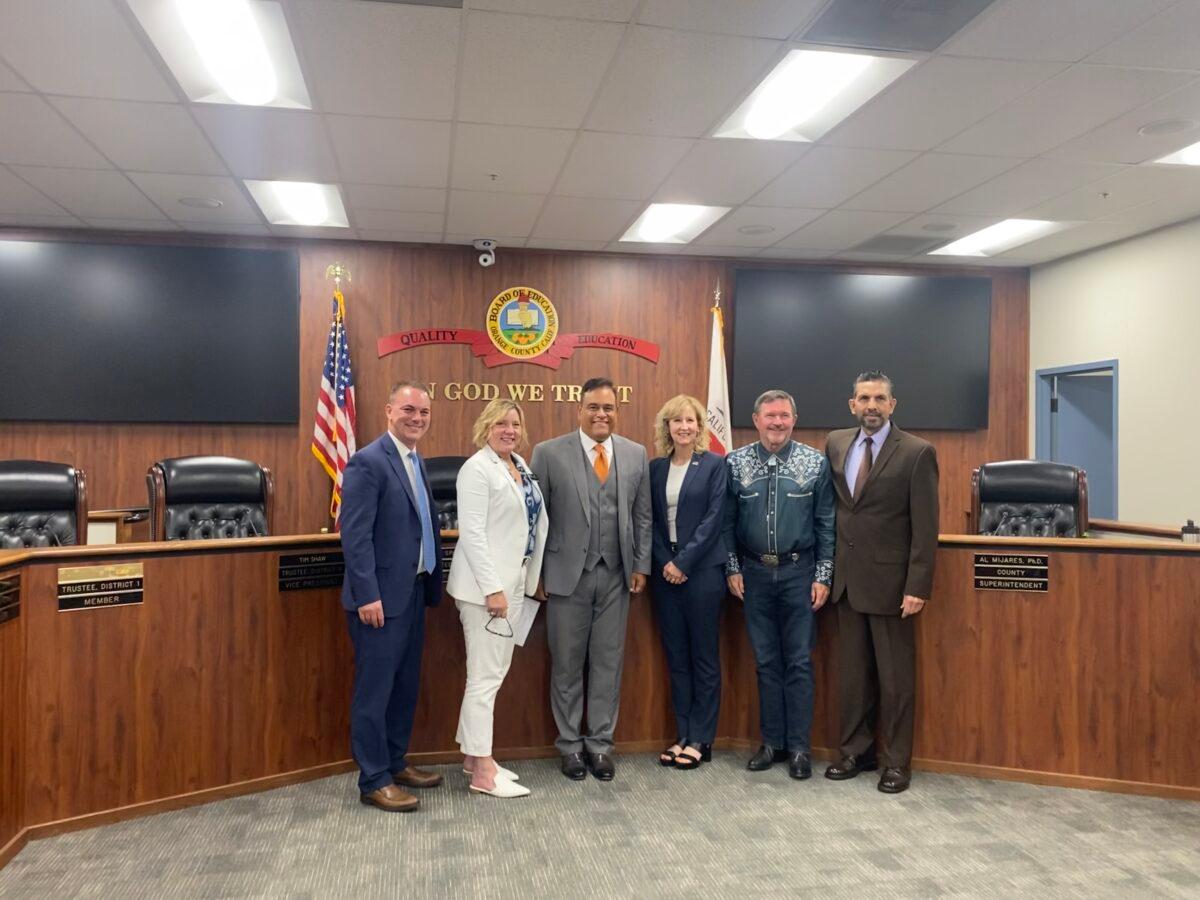 (L-R) The Orange County Board of Education trustees Tim Shaw, Lisa Sparks, Jorge Valdes, Mari Barke, Ken Williams, and the county Superintendent of Schools Al Mijares during a meeting at the Orange County Department of Education in Costa Mesa, Calif., on Aug. 17, 2022. (Micaela Ricaforte/The Epoch Times)