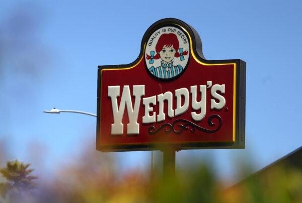 A sign in front of a Wendy's restaurant. (Justin Sullivan/Getty Images)