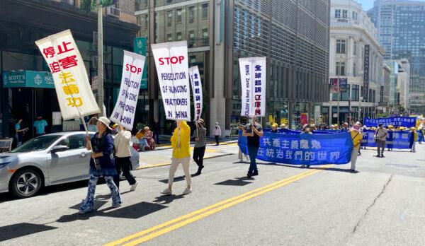 Falun Gong practitioners call for an end to the persecution in China during a parade celebrating over 400 million people quitting the Chinese Communist Party in San Francisco on Aug. 20, 2022. (Ilene Eng/NTD)