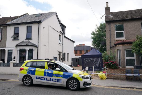 Police searching for missing nurse Owami Davies outside a property in Derby Road, West Croydon, south London, on Aug. 3, 2022. (PA)