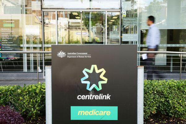 A man walks into a Medicare and Centrelink office at Bondi Junction in Sydney, Australia, on March 21, 2016. (Matt King/Getty Images)