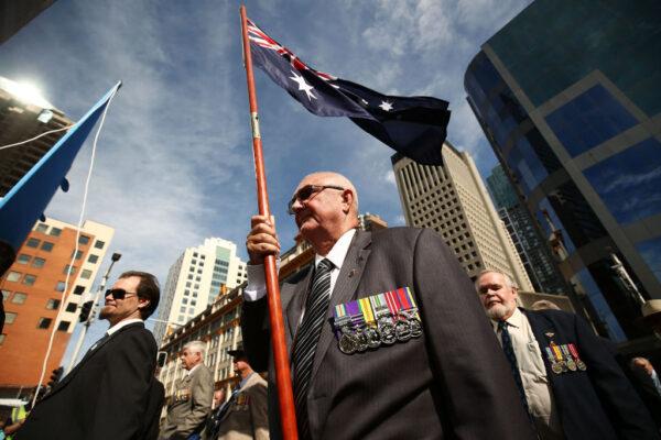War veterans make their way down Elizabeth Street during the ANZAC Day parade in Sydney, Australia, on April 25, 2017. (Brendon Thorne/Getty Images)