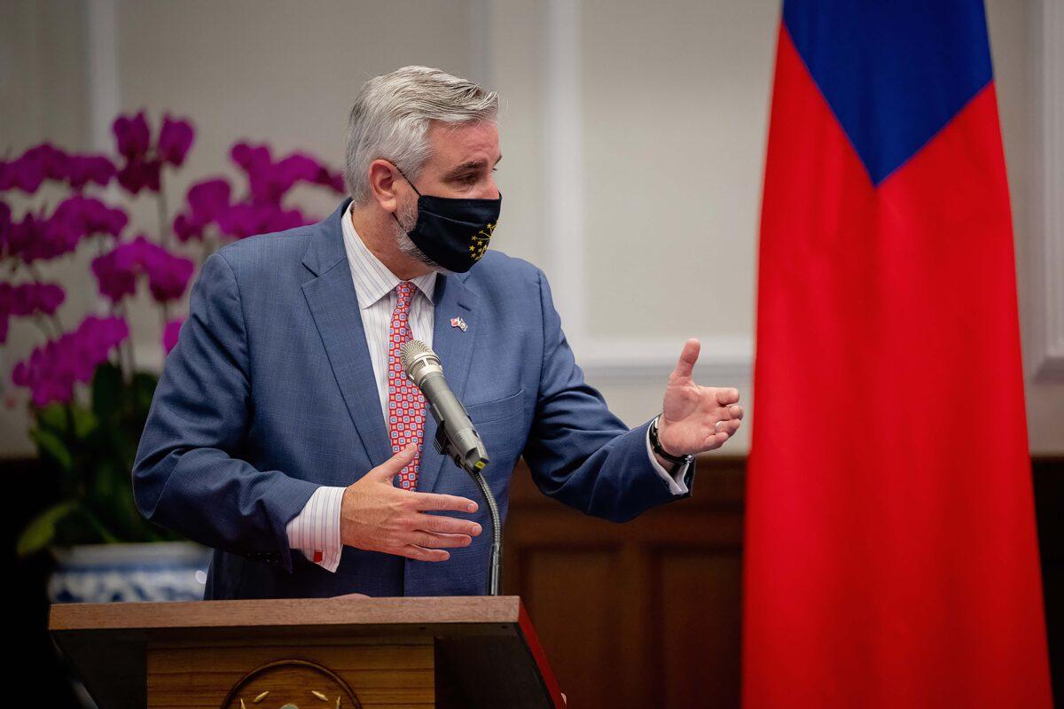 U.S. Indiana Governor Eric Holcomb speaks during a meeting with Taiwan's President Tsai Ing-wen, unseen, at the Presidential office in Taipei, Taiwan, on Aug 22, 2022. (Taiwan Presidential Office via AP)