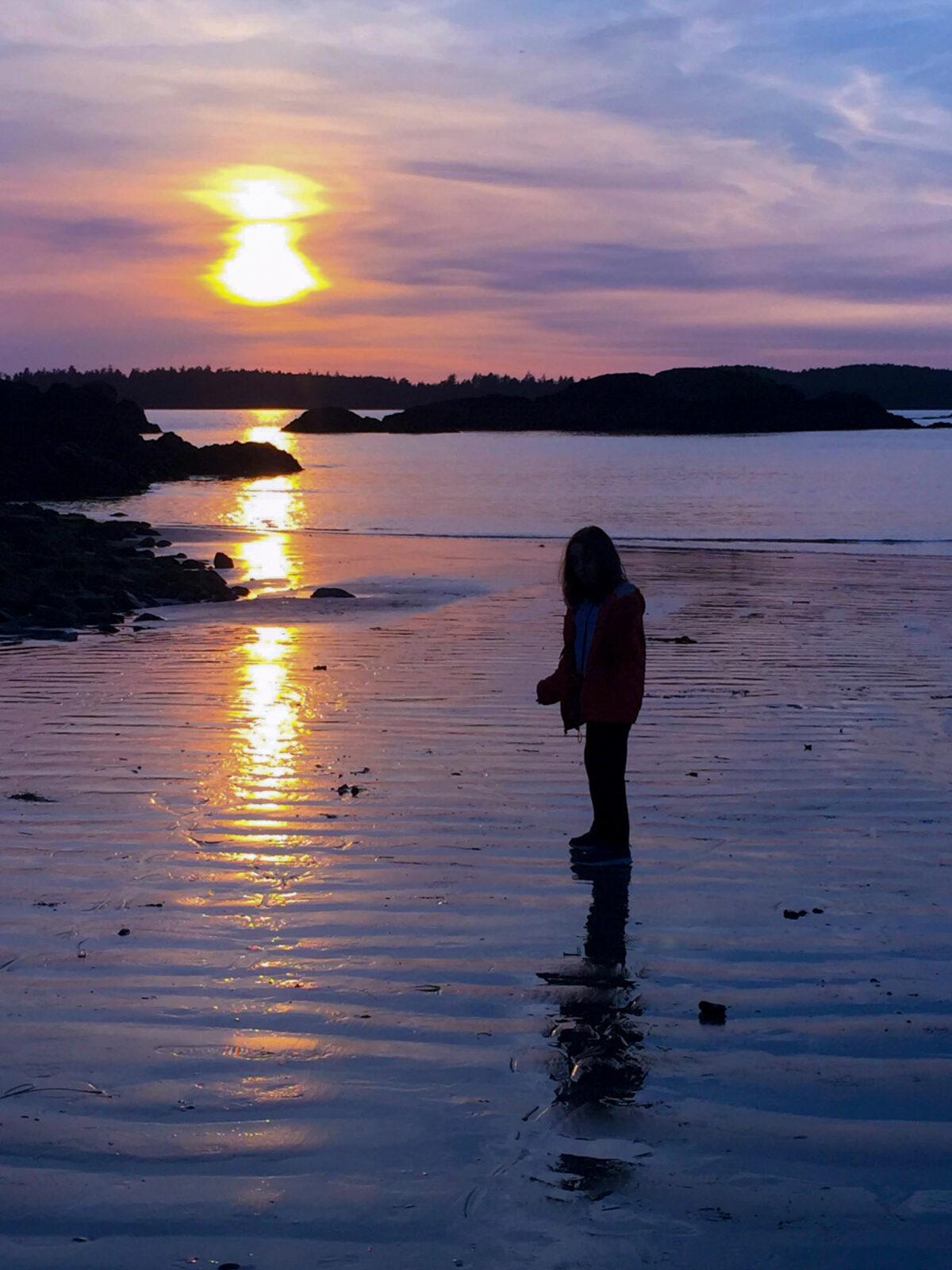 Tofino, the beach at sunset with a silhouette of our daughter. (Courtesy of Michelle Sutter)