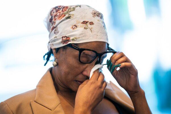 Nicol Davies, the mother of missing student nurse Owami Davies, wipes away tears as she speaks to the media at New Scotland Yard, central London, on Aug. 3, 2022. (PA)