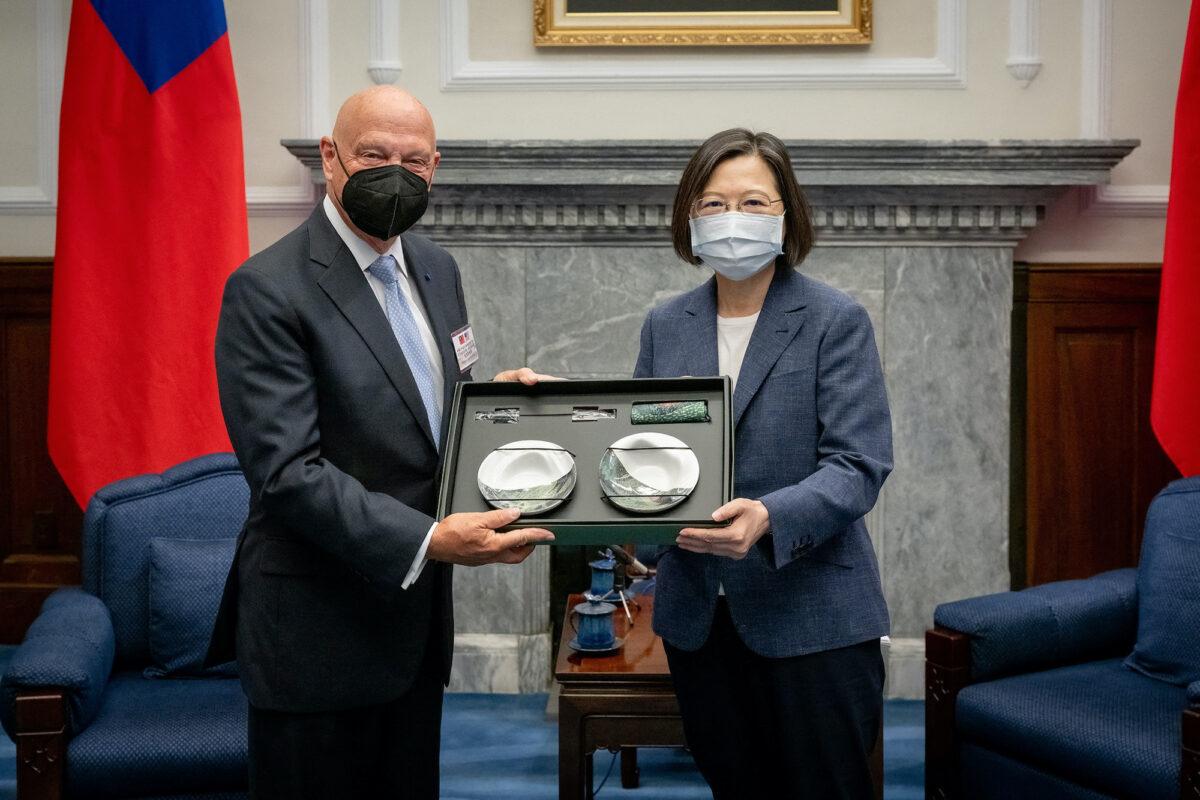 Taiwan's President Tsai Ing-wen and James O. Ellis, a visiting fellow at Hoover and retired U.S. Navy admiral pose for a photo at the Presidential building in Taipei, Taiwan, on Aug. 23, 2022. (Taiwan Presidential Office/Handout via Reuters)