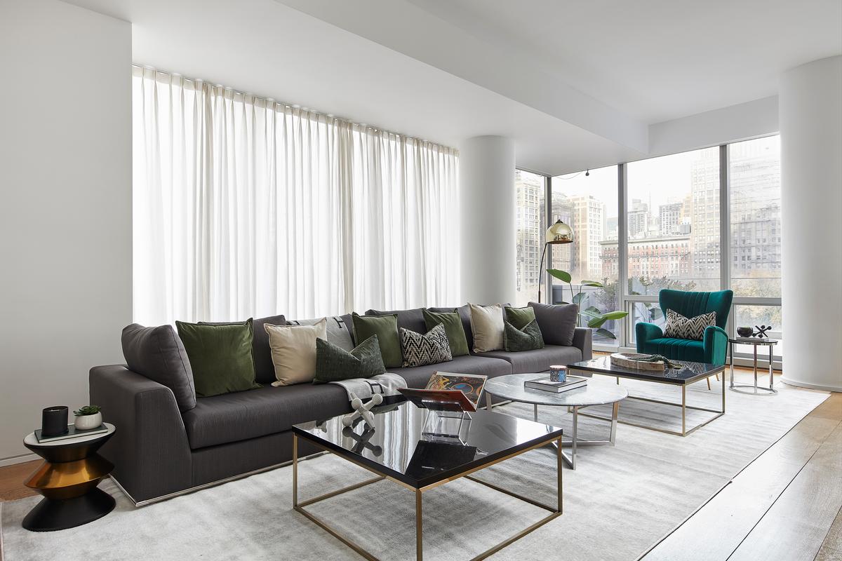 Green accents and accent furniture helps to create instant visual interest in this living space. (Scott Gabriel Morris/TNS)