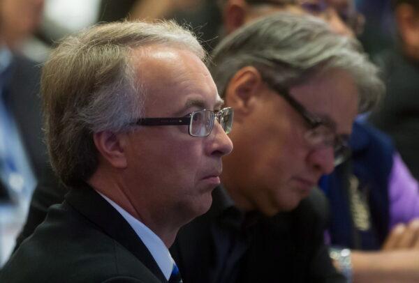 Then-B.C. minister of aboriginal relations and reconciliation John Rustad (L), who is now leader of the Conservative Party of British Columbia, looks on during a gathering of First Nations leaders and B.C. cabinet ministers in Vancouver on Sept. 10, 2015. (The Canadian Press/Darryl Dyck)