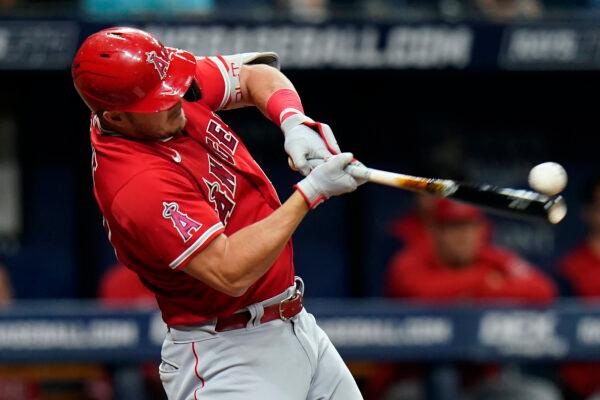 Los Angeles Angels' Mike Trout connects for an RBI single off Tampa Bay Rays starting pitcher Jeffrey Springs during the fifth inning of a baseball game in St. Petersburg, Fla. Aug. 22, 2022. (Chris O'Meara/AP Photo)