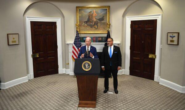 President Joe Biden announces student loan relief with Education Secretary Miguel Cardona in the Roosevelt Room of the White House in Washington, on Aug. 24, 2022. (Olivier Douliery/AFP via Getty Images)