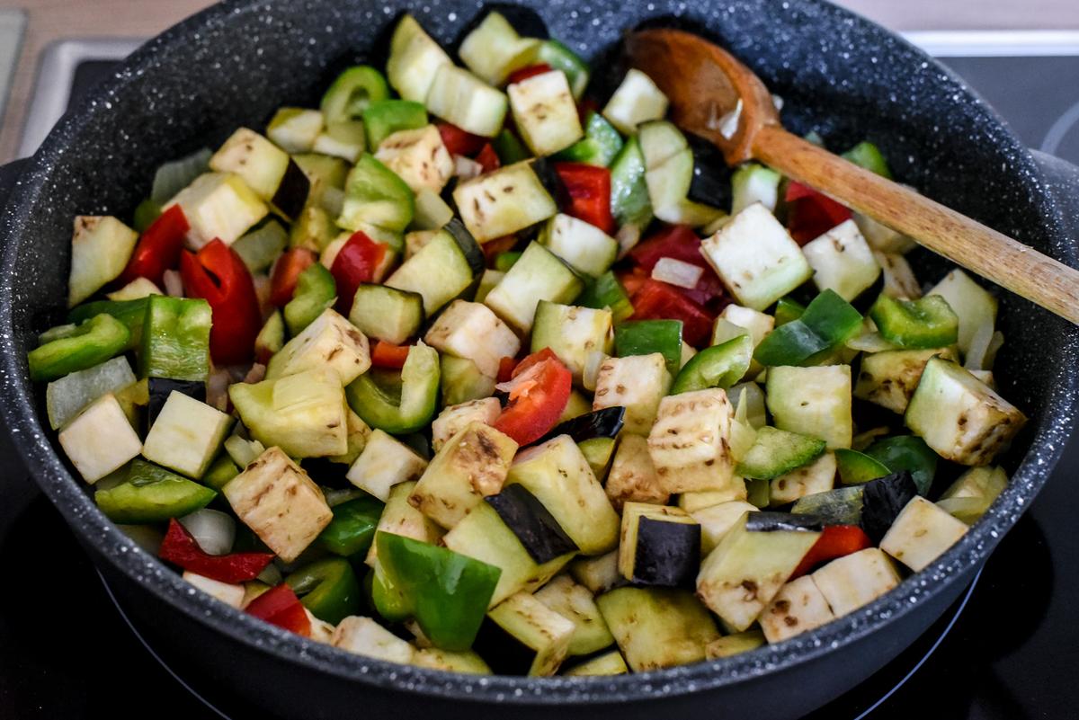 Add the bell peppers and eggplants and cook until soft. (Audrey Le Goff)