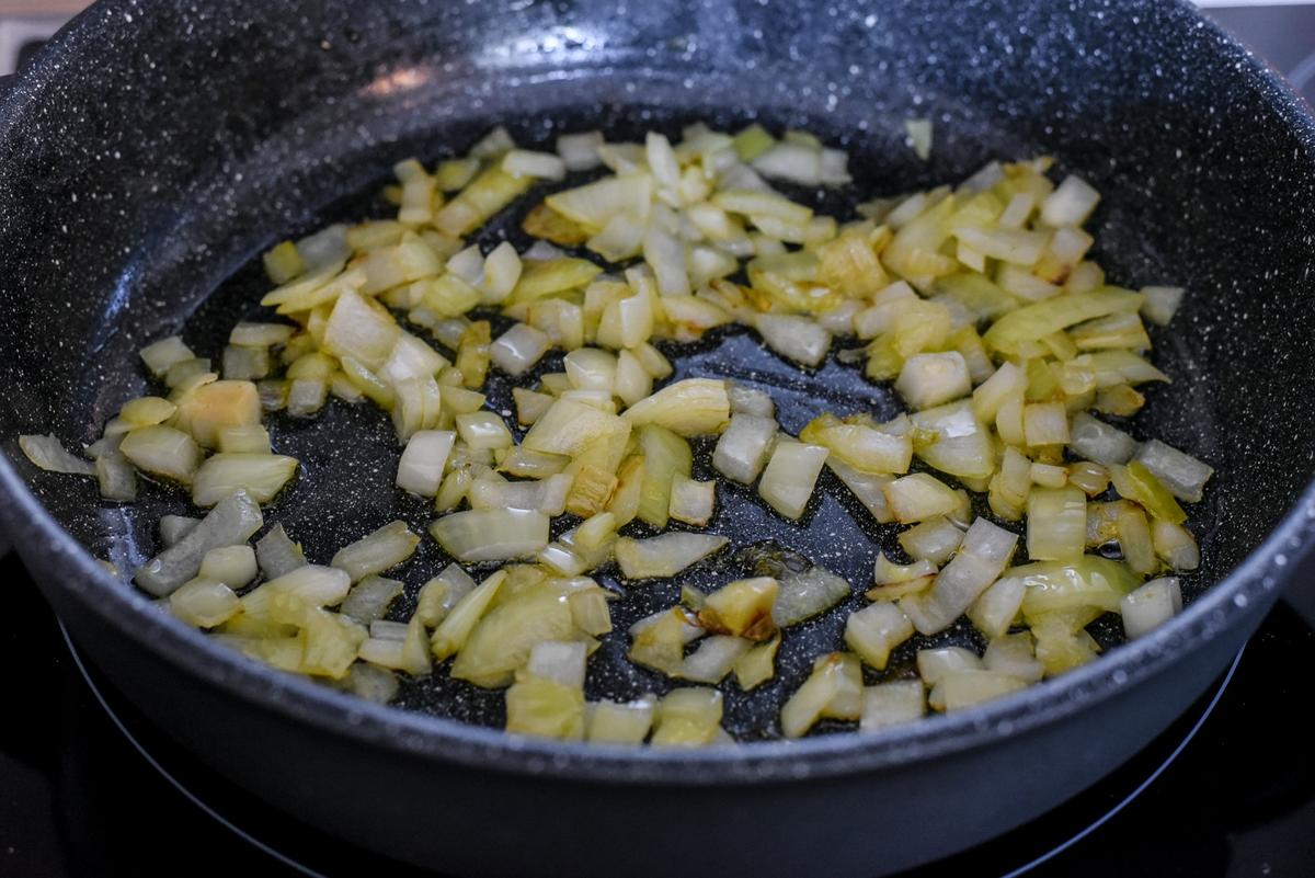 Cook the onion until glistening and fragrant. (Audrey Le Goff)