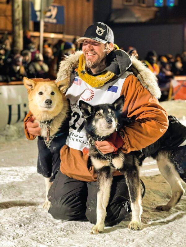Sass with his lead dogs, Slater (L) and Morello, at the completion of the 2022 Iditarod race. (Courtesy of Brent Sass)