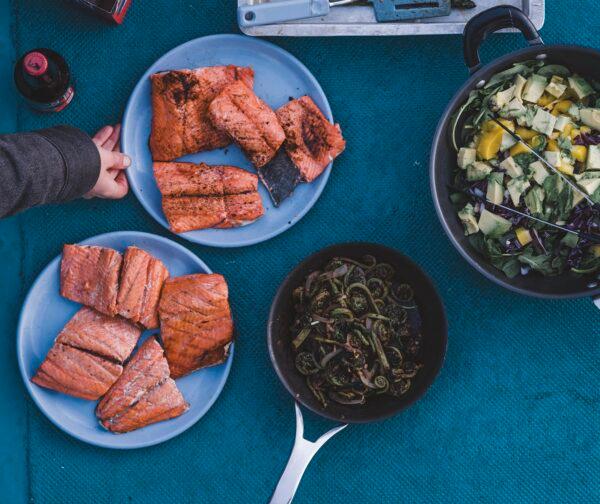 A meal of freshly caught and grilled salmon, prepared and enjoyed at sea. (Camrin Dengel)