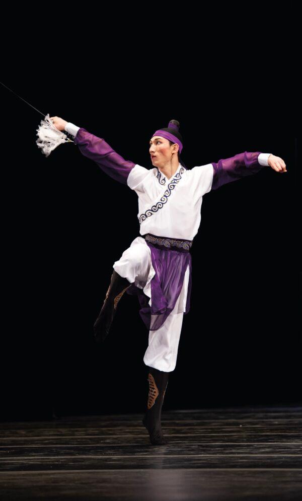 Wang competes inthe 2010 NTD International Classical Chinese Dance Competition, portraying a knight who must decide how to use his sword skills nobly. (Courtesy of Shen Yun Performing Arts)