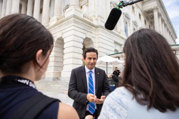Sen. Brian Schatz (D-Hawaii) speaks to reporters on Capitol Hill in Washington on Aug. 6, 2022. (Anna Rose Layden/Getty Images)