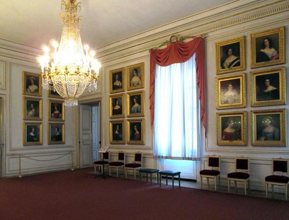The famous Gallery of Beauty consists of 36 portraits by court painter Joseph Karl Stieler.  This collection of portraits was initially displayed in the Munich Residence (the former residence of Bavarian electors, dukes, and kings), and later transferred to Nymphenburg. At the time, exterior beauty was a sign of moral perfection as reflected by the beauties portrayed in the gallery, and beauty and art are omnipresent in this palace. (<a href="https://upload.wikimedia.org/wikipedia/commons/8/85/Schloss_Nymphenburg_-_Die_Sch%C3%B6nheitengalerie.jpg">Kaho Mitsuki/CC BY-SA 3.0</a>)