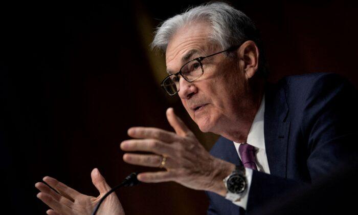 World Stocks Steady, Dollar Ticks Up on Powell-Watch