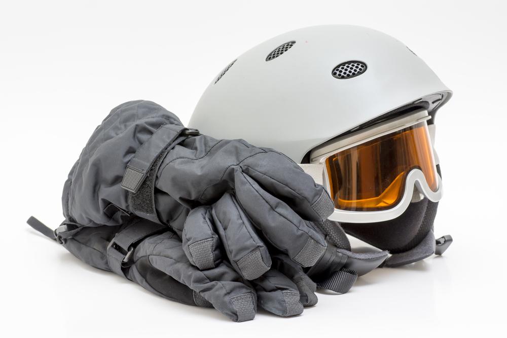 Properly fitting gloves, a helmet, and goggles are must-haves to get the most enjoyment out of every run. (cagi/Shutterstock)