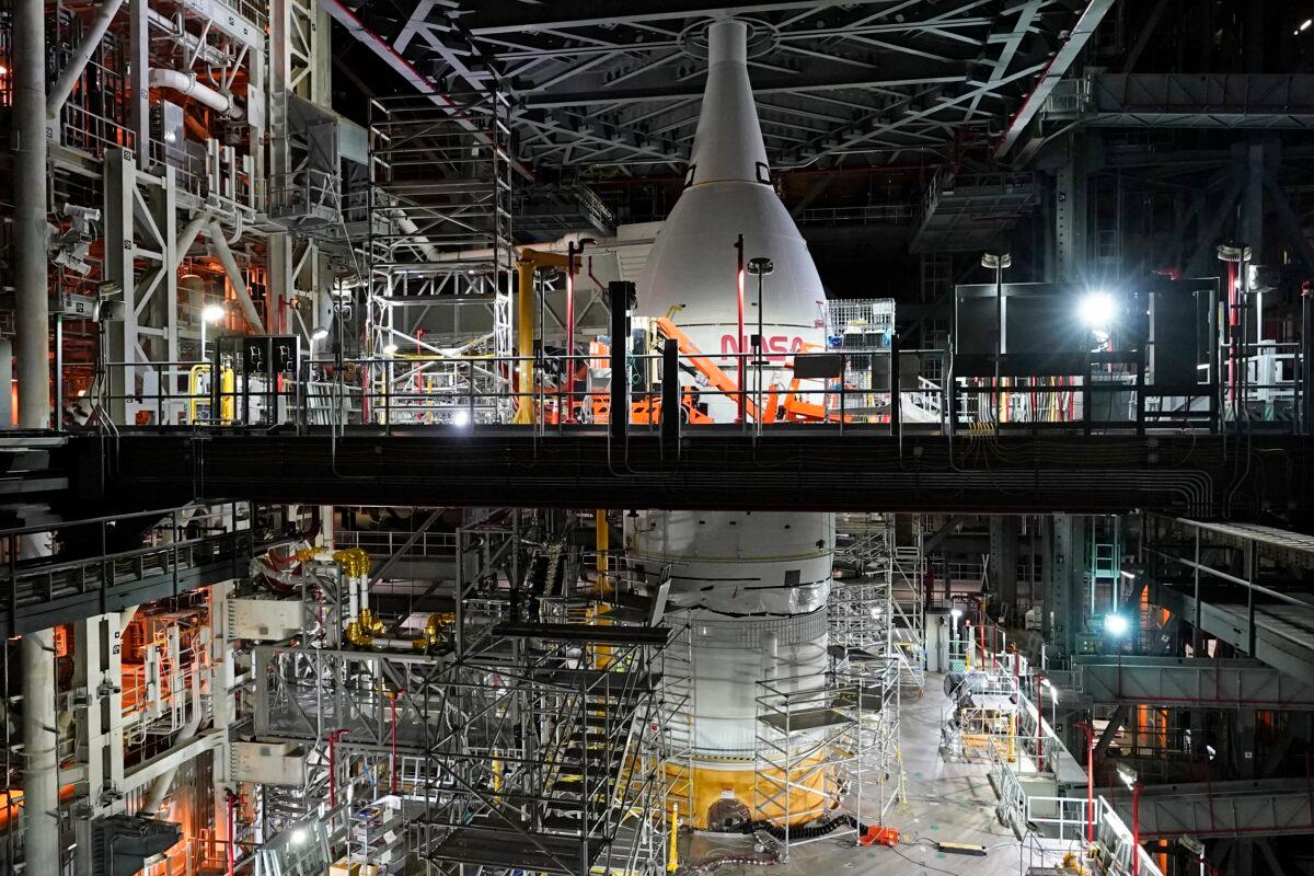 A section of the Artemis rocket with the Orion space capsule inside the Vehicle Assembly Building at the Kennedy Space Center in Cape Canaveral, Fla., on Nov. 5, 2021. (John Raoux/AP Photo)