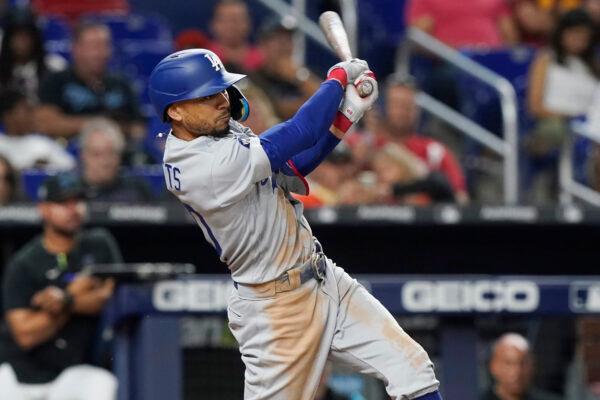 Los Angeles Dodgers' Mookie Betts (50) hits a two-run home run in the seventh inning of a baseball game against the Miami Marlins in Miami, Aug. 26, 2022i. (Marta Lavandier/AP Photo)