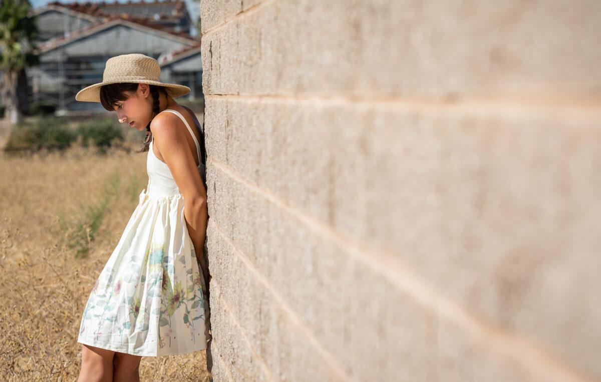 Chole Cole, who once identified as transgender and had her breasts removed at 15 years old, but now regrets the surgery, stands near her home in Northern California on Aug. 26, 2022. (John Fredricks/The Epoch Times)