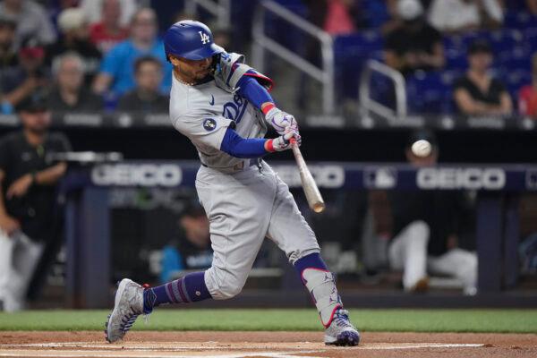 Mookie Betts of the Los Angeles Dodgers hits a home run in the first inning against the Miami Marlins at loanDepot Park in Miami, Flor., Aug. 28, 2022. (Eric Espada/Getty Images)