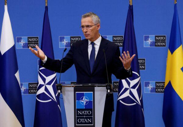  NATO Secretary General Jens Stoltenberg gestures during a news conference at the alliance's headquarters in Brussels on July 5, 2022. (Yves Herman/Reuters)